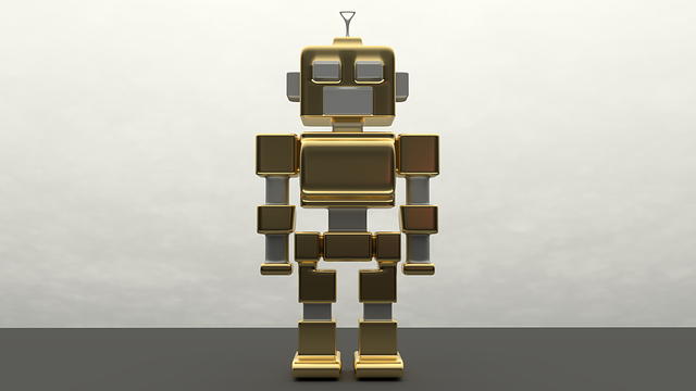Zlato-strieborný kovový robot.png